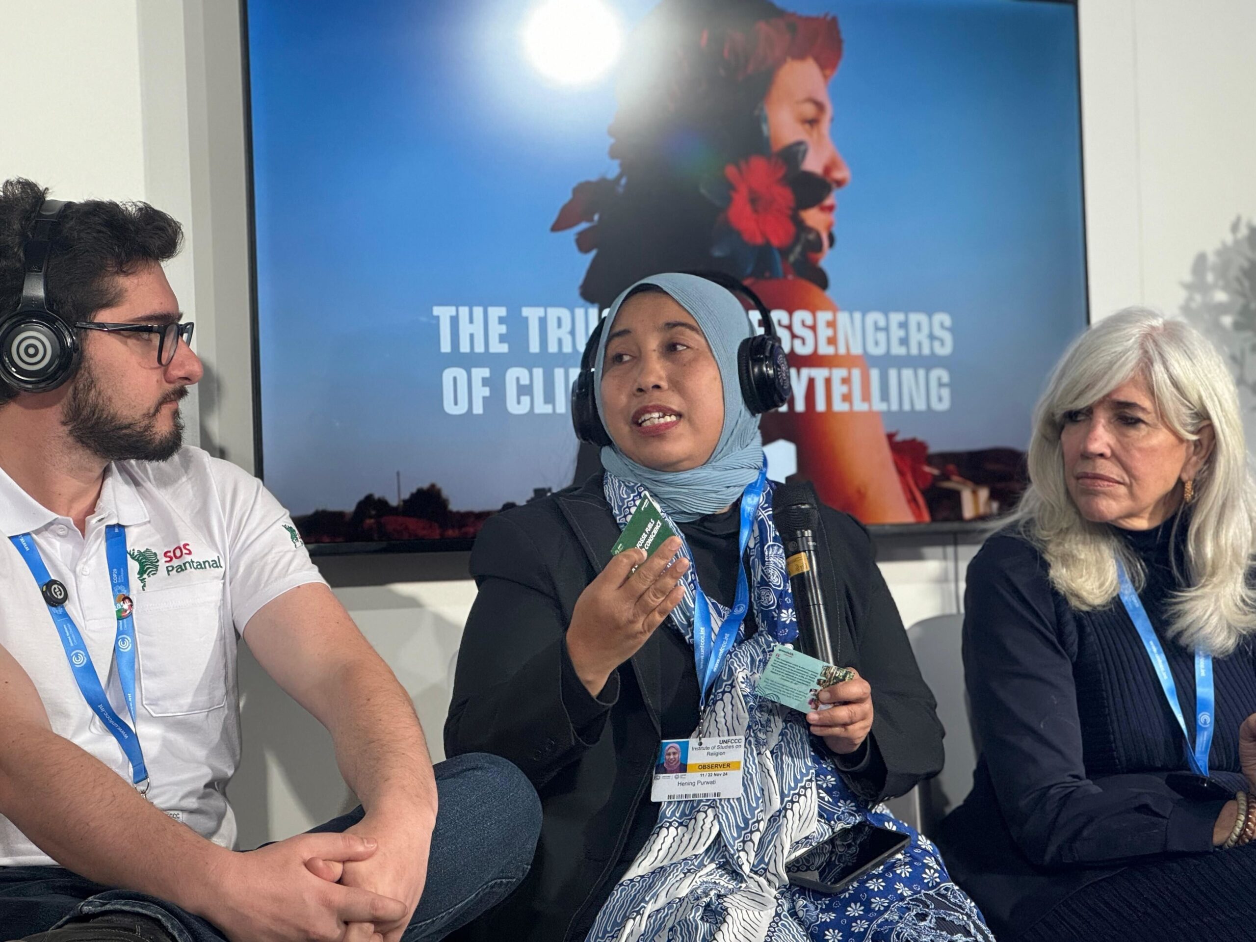 Person speaking at Panel at COP29. 